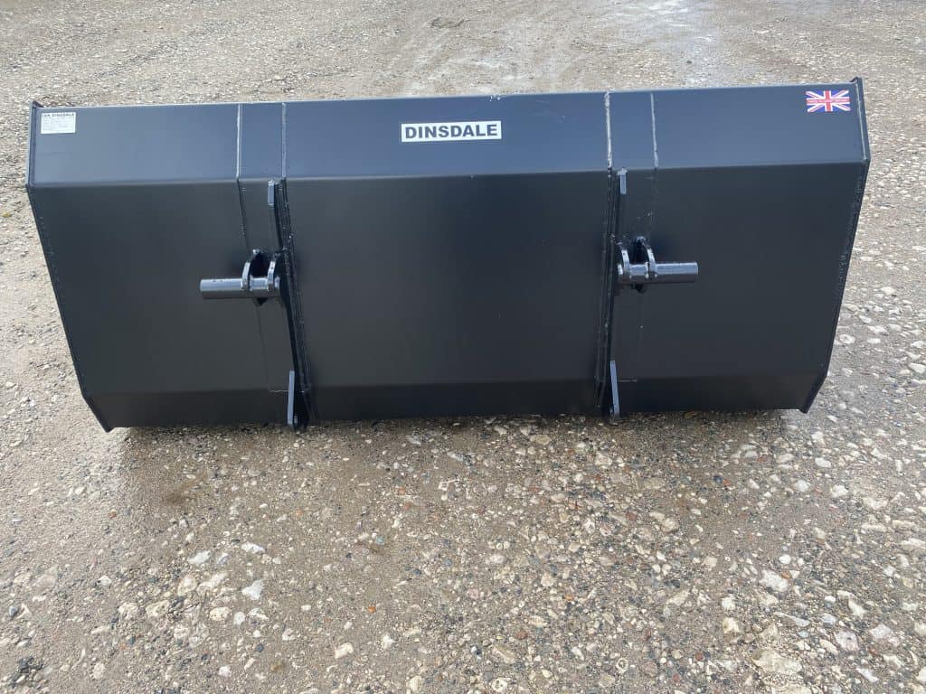 High-strength black wheel loader bucket with quick-attach mechanism for industrial use.