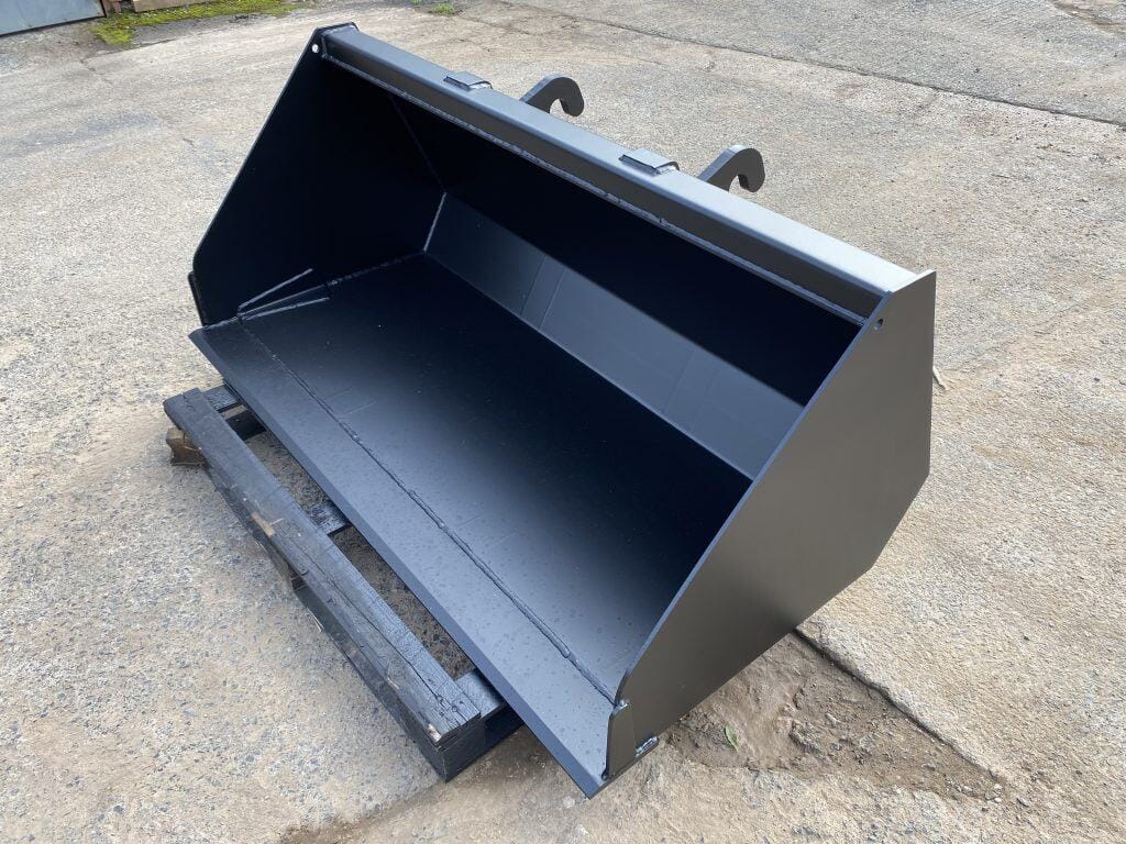 Versatile black loader bucket for construction and agricultural machinery. Durable steel for tough loads and tough environments.