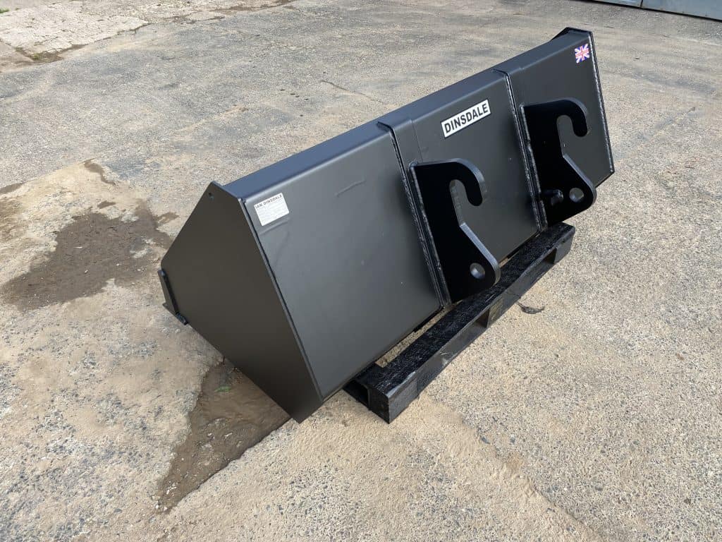High-quality black excavator bucket with durable hooks and branding, ideal for construction projects.